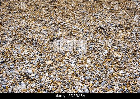 Beautiful and colourful sea pebbles background. Rock and stones abstract Stock Photo