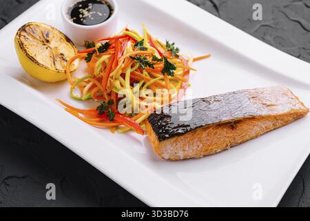 Food, Grilled salmon fillet steak with vegetable salad Stock Photo