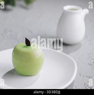 Food, Apple shaped mousse cake and tea Stock Photo