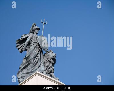 Plymouth, UK  - Sep 25 2025: The statue of Britannia on the Armada Memorial in Plymouth, UK, set against a clear blue sky. Stock Photo