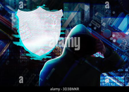 Cyber attack. Hacker in hood and shield, glitch effect Stock Photo