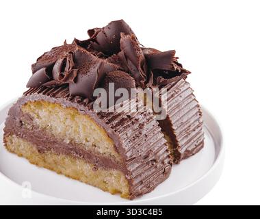 Food, Chocolate roll with cream on a white plate Stock Photo