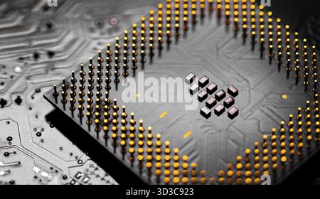 Macro Close up of microchips and pins on Main CPU PC processor circuit board Stock Photo