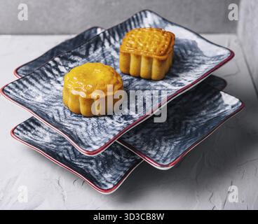 Food, Two chinese cakes on traditional plates Stock Photo