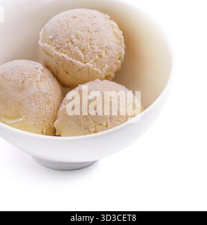 Food, Three balls of vanilla-banana ice cream in white bowl Stock Photo