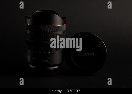 Lviv, Ukraine - November 4, 2025:Canon RF 10 20mm Wide Angle Lens on Black Stock Photo