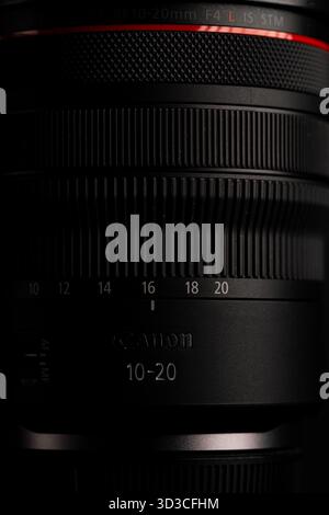 Lviv, Ukraine - November 4, 2025:Canon RF 10 20mm Wide Angle Lens on Black Stock Photo