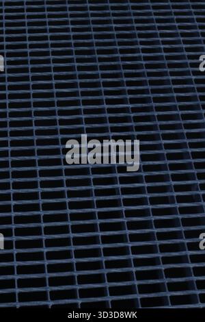 Abstract geometric metal surface with repeating grid pattern, minimal industrial texture Stock Photo