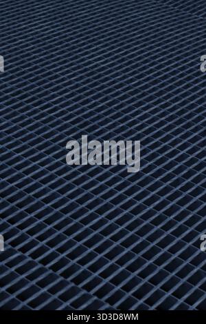 Abstract geometric metal surface with repeating grid pattern, minimal industrial texture Stock Photo