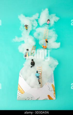 Clouds and little people on a ladder coming out of an envelope. Growth, future, development concept. Minimal business composition. Stock Photo