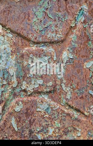 Colorful texture of a decaying old rusty gasoline canister Stock Photo