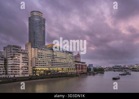 London, England - July 26, 2017 : The Oxo and South Bank Towers buildings as seen from the Blackfrairs bridge at dusk, London Stock Photo