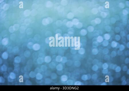 Cold blue lights bokeh suitable to be used as background Stock Photo