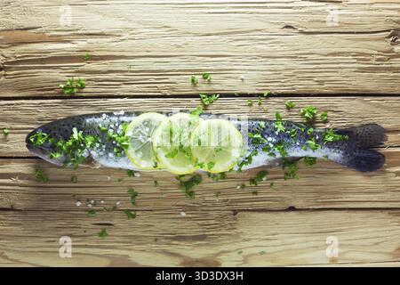 Whole Raw Trout With Lemons And Parsley Stock Photo
