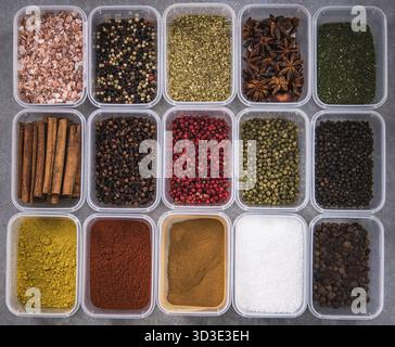 All spices in boxes from above Stock Photo