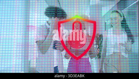 Showing red shield lock covering team in office, wearing office wear, using phone tablet data-grid Stock Photo