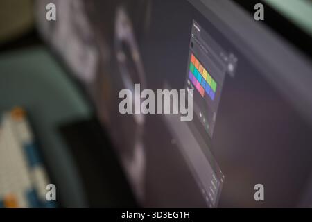 Designer Editing Photo On Computer In Office Stock Photo