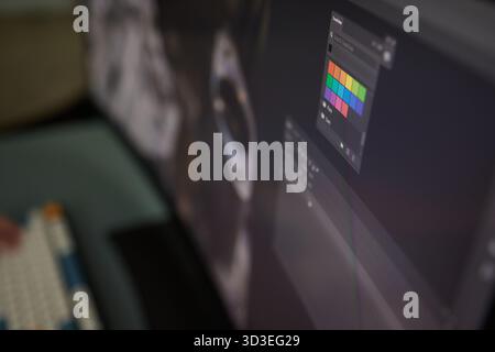Designer Editing Photo On Computer In Office Stock Photo