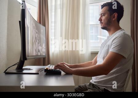 Designer Editing Photo On Computer In Office Stock Photo