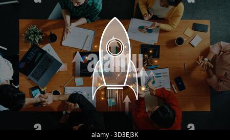 Dynamic business meeting scene featuring diverse professionals collaborating. The launch concept symbolizes growth and innovation with a focus on Stock Photo