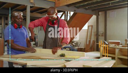 Drilling men in safety goggles using power drill on plank in wood shop, with tape measure Stock Photo