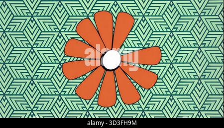 Featuring orange flower graphic centering on mint green and teal pattern, with twelve petals Stock Photo