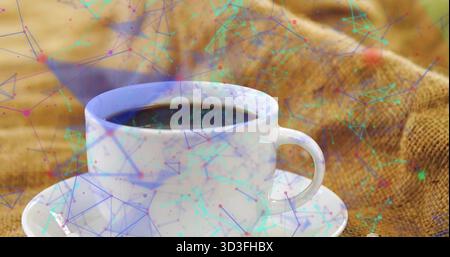 Featuring white ceramic cup filled with black coffee on burlap in rustic cafe, with network overlay Stock Photo