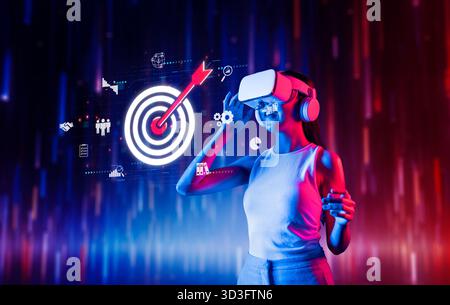 A businesswoman immersed in virtual reality, exploring targeting strategies and marketing concepts through engaging digital graphics and data Stock Photo