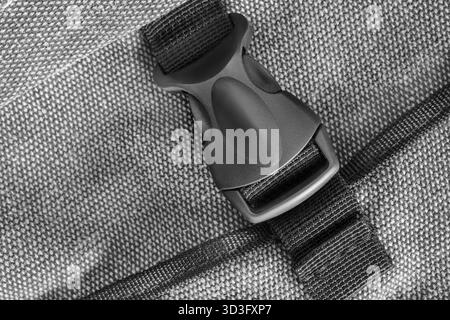 Canvas grey bag black plastic fastex lock closeup Stock Photo