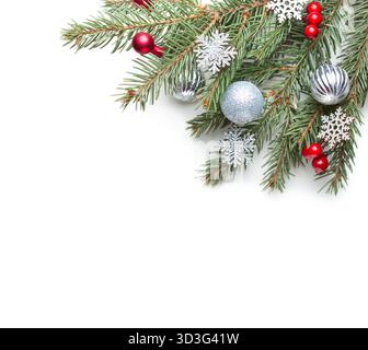 Fir branches with Сhristmas ornaments isolated on white background. Flat lay. Stock Photo