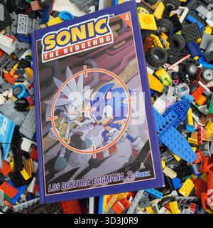 A book laying on Lego bricks Stock Photo