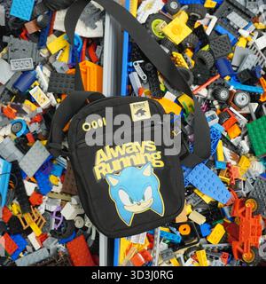 A book laying on Lego bricks Stock Photo