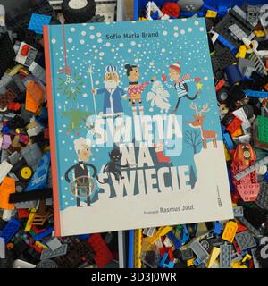 A book laying on Lego bricks Stock Photo