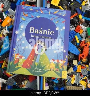 A book laying on Lego bricks Stock Photo