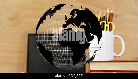 Wireframe globe floating over study desk with chalkboard, mug of colored pencils, scissors on books Stock Photo