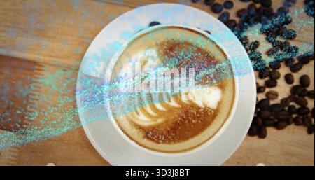 Showcasing white cup on saucer sitting on wooden cafe table, with latte art and coffee beans Stock Photo