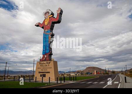 West Wendover, Nevada - Wendover Will, a neon-lit cigarette smoking cowboy, welcomes travelers to West Wendover. Stock Photo