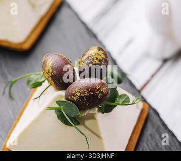 Food, Dessert souffle cookies with chocolate Easter eggs Stock Photo