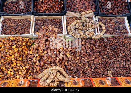 Display of figs and dates at a market stall in the Medina at Marrakech, Morocco Stock Photo