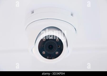 CCTV camera on the hull of an expensive motor yacht. CCTV camera white on a white body Stock Photo