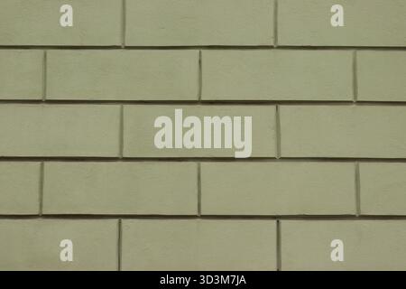 Light green plastered wall with rectangular pattern Stock Photo