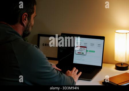 Middle Aged Gray Hat Hacker Minting Crypto Meme Coin for Potential Rug Pull Concept - Cryptocurrency Idea Based Around Creating New Coin Gets Virus Stock Photo