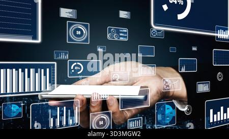 A person holds a smartphone against a backdrop of digital analytics and data visualizations, showcasing the intersection of technology and Stock Photo