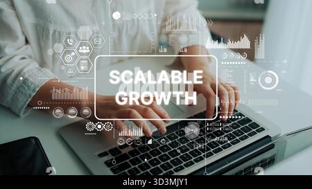 Hands Typing on Laptop with Futuristic Graphics Displaying Scalable Growth in Business and Technology Environment. Asymptotic smart data analytic. Stock Photo