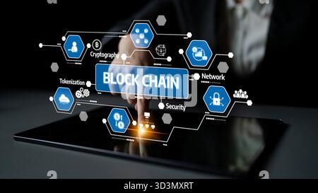 A close-up image depicting hands interacting with a blockchain technology interface on a tablet, showcasing elements of security, network, and Stock Photo