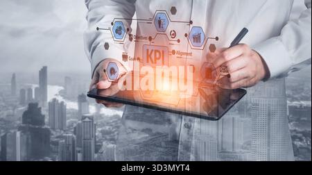 A businessman analyzes key performance indicators on a tablet, showcasing graphs and data in a futuristic city skyline setting, highlighting the Stock Photo