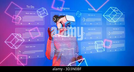 Explore the future of project management in a business office setting, utilizing virtual reality for task tracking, agile planning, and enhanced team Stock Photo