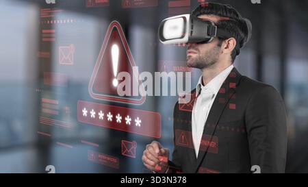 A businessman immersed in a virtual reality experience while interacting with digital displays featuring warning alerts, emphasizing modern technology Stock Photo