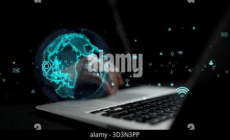 A modern laptop displays a holographic globe, symbolizing digital communication and global connectivity, emphasizing technology and innovation in a Stock Photo