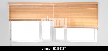Big window with blinds in room Stock Photo